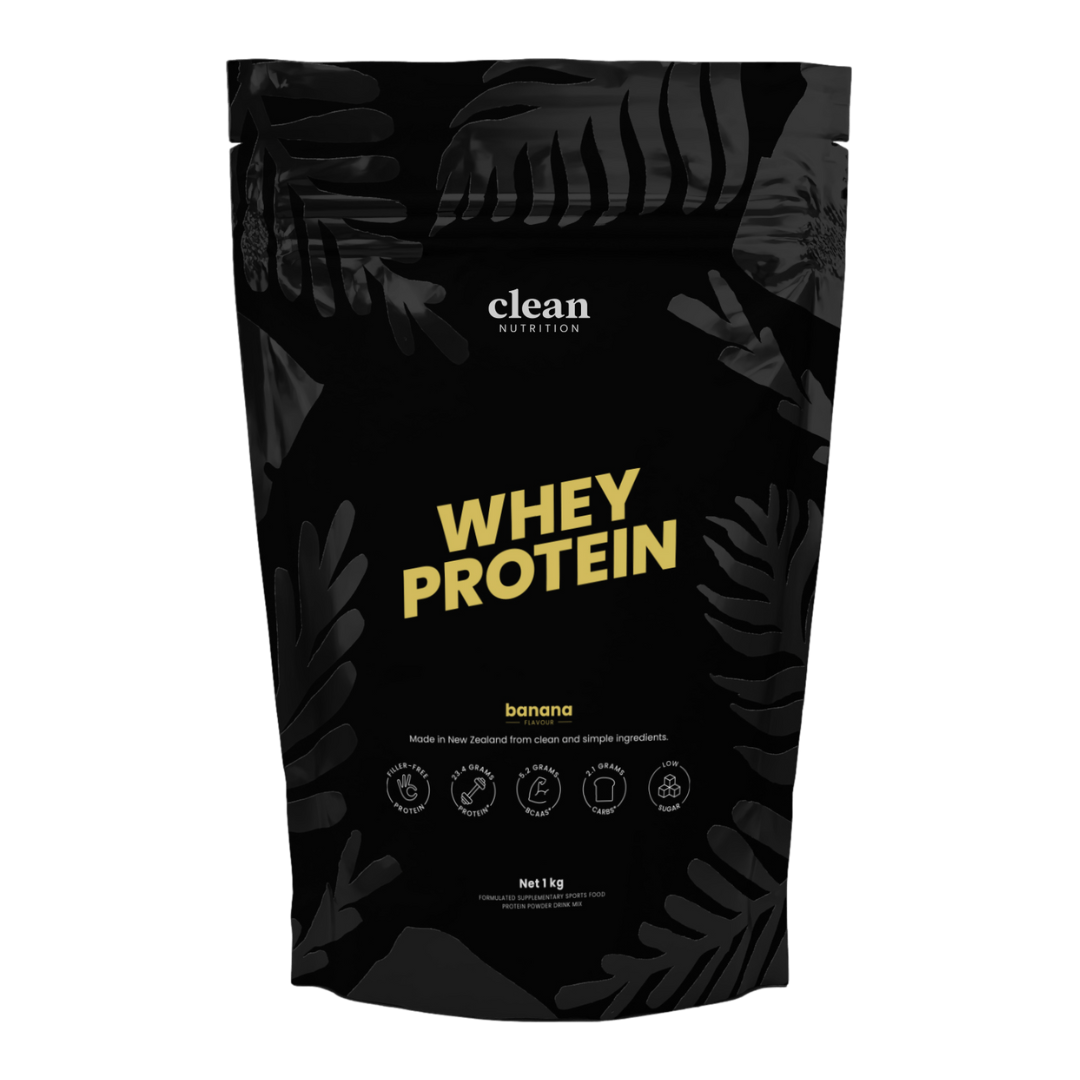 Black whey protein package with banana flavor and clean nutrition label on a white background
