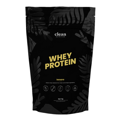 Black whey protein package with banana flavor and clean nutrition label on a white background