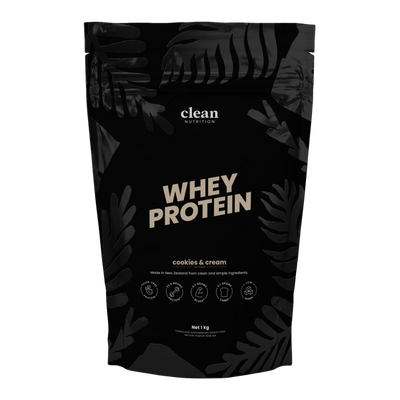 Black whey protein package with 'clean nutrition' branding and leaf patterns on a white background